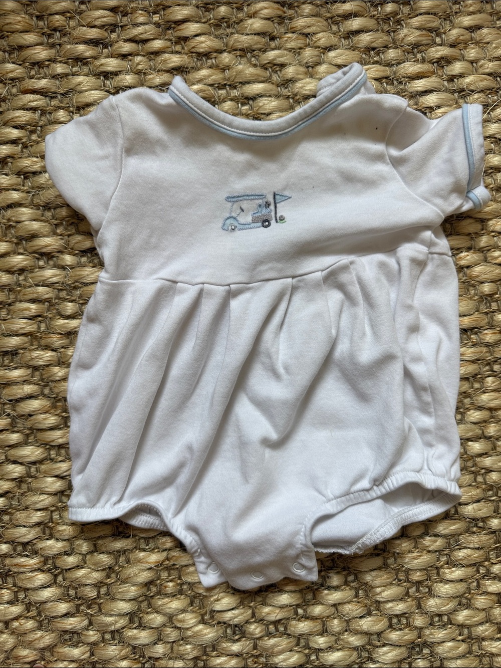 Classic White Baby One-Piece with Light Blue Trim and Golf Cart Motif